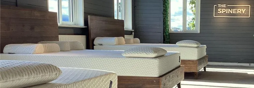Inside The Spinery showroom — mattresses on display