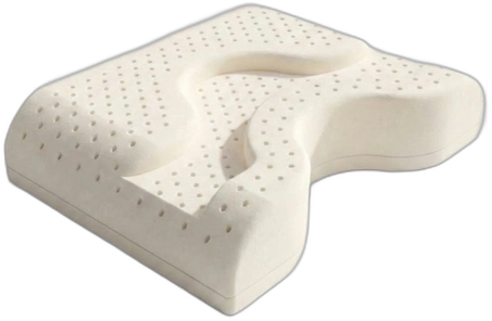The Spinery Pillow at a three-quarter angle, showing the central contoured cradle and pin-cored natural latex surface