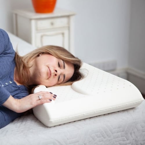 The Spinery Pillow — lifestyle, woman sleeping